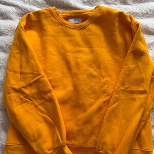 Aritzia TNA Orange Crewneck